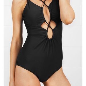 Strappy One-piece black swimsuit - never been worn